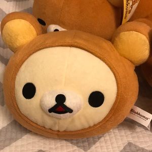 Korilakkuma and rilakkuma head plushies
